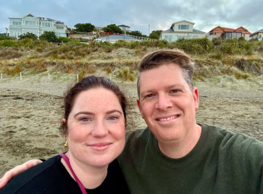 Georgia and her partner with a dunes background
