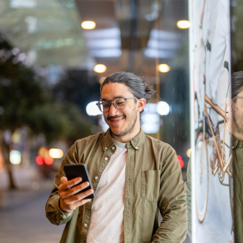 image manlookingathisphone header